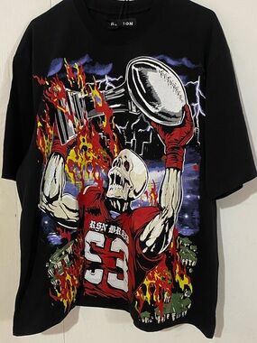 Reason Black Tee with Red & Yellow Flaming Skull Football Graphic